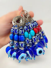 Load image into Gallery viewer, Oval beads evil eye keychain